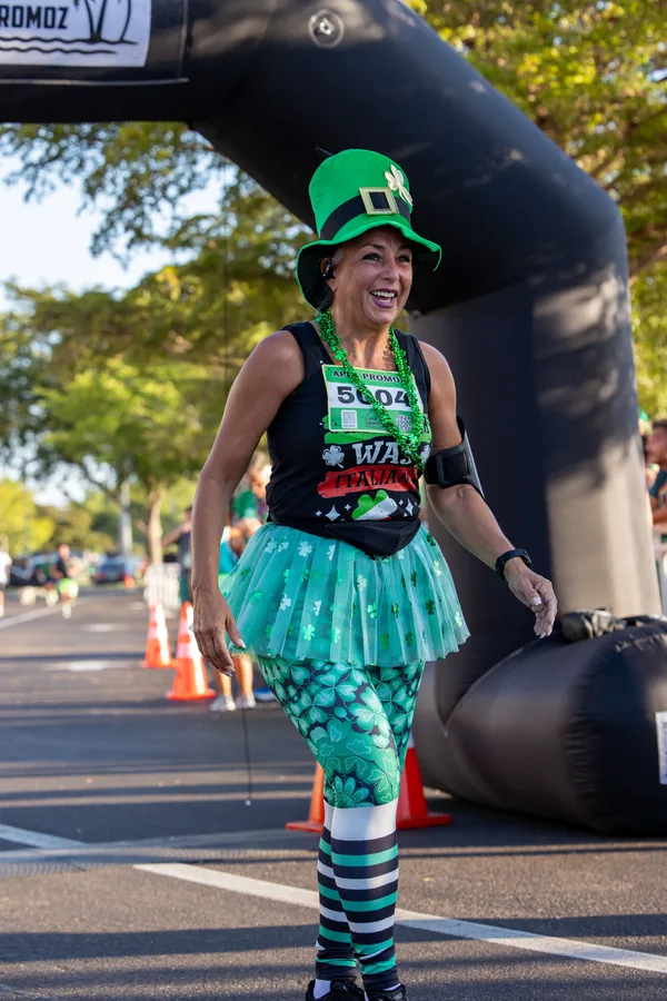 Image of attendees n St Patty's day attire at an Apex Promoz & the Bell Tower Shops event