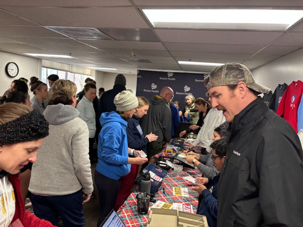 NCMC Turkey Trot account manager, James Armington, volunteering at packet picket